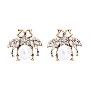 Cream Little Bee Earrings in Antique Gold