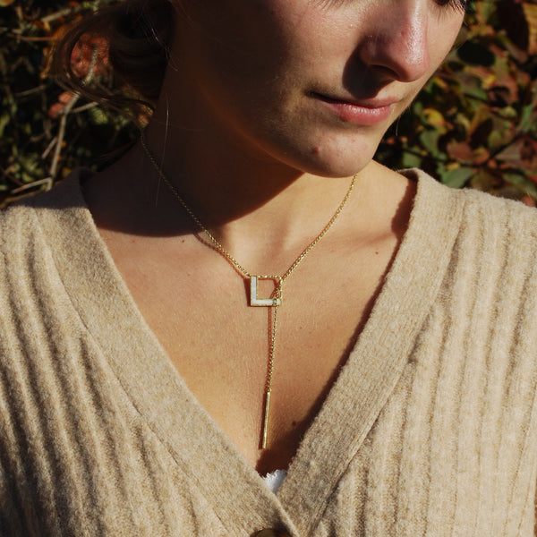 Thread Through Mother of Pearl in Brushed Gold
